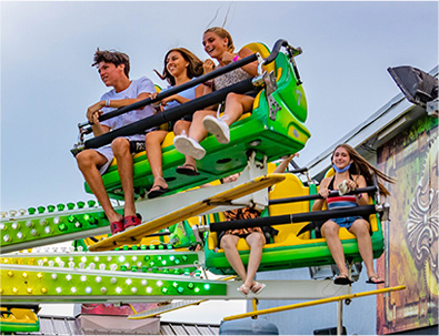 Kids on ride at Amusement Park